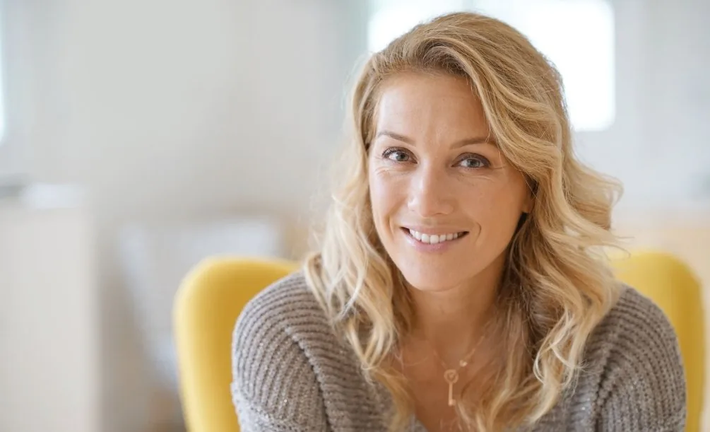 Woman in a beige sweater