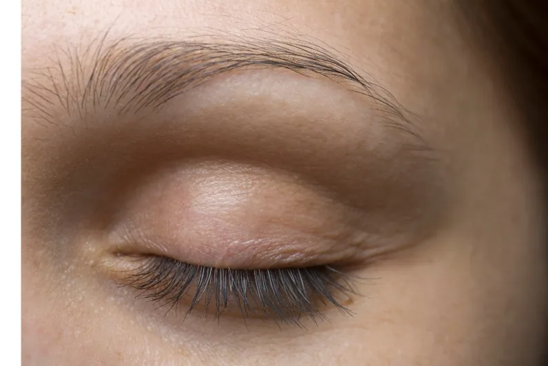 Closeup of a relaxed closed eye
