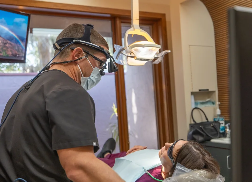 Dr. Nawrocki speaking with a dental patient