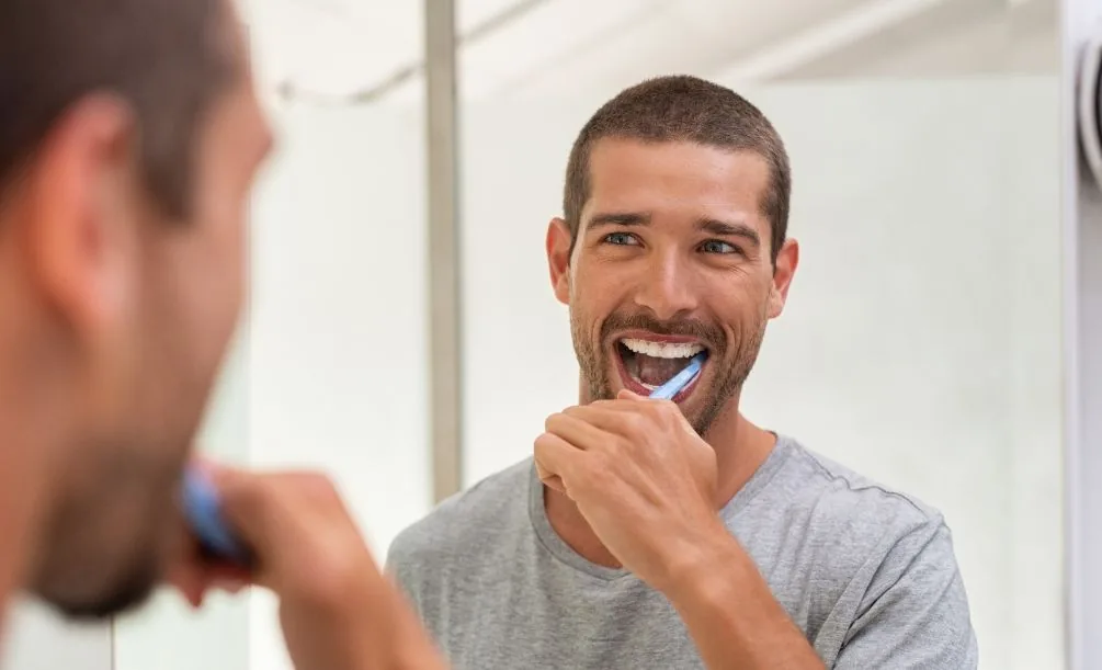 Man brushing his teeth