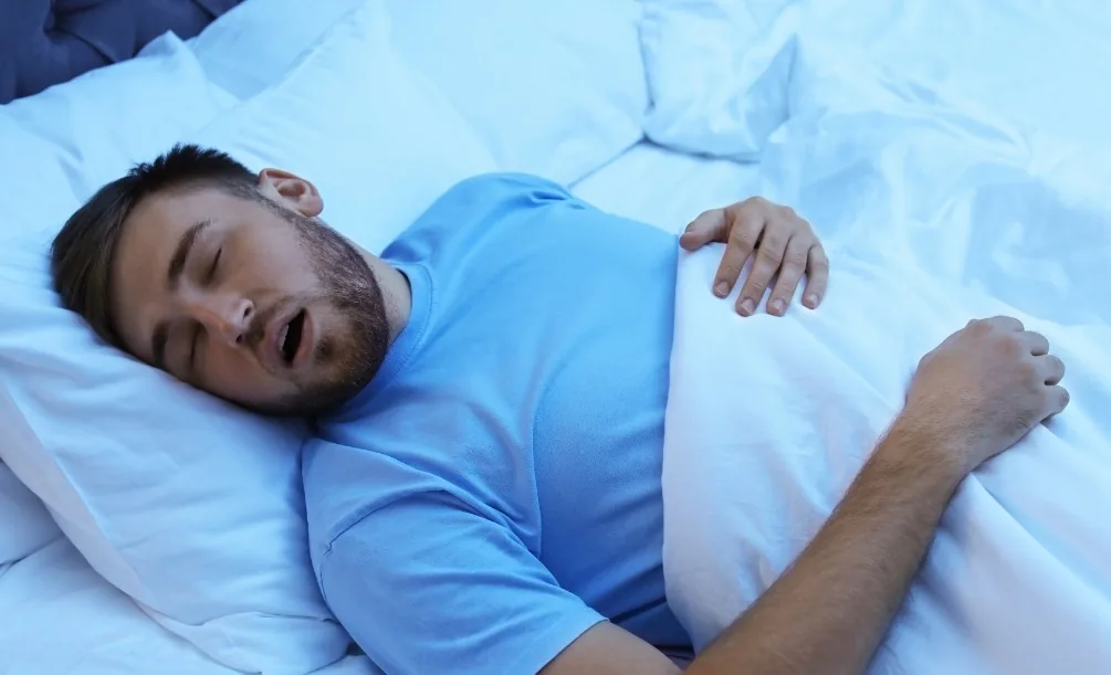 Man snoring before sleep apnea treatment