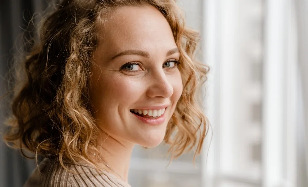 Woman smiling after dental care