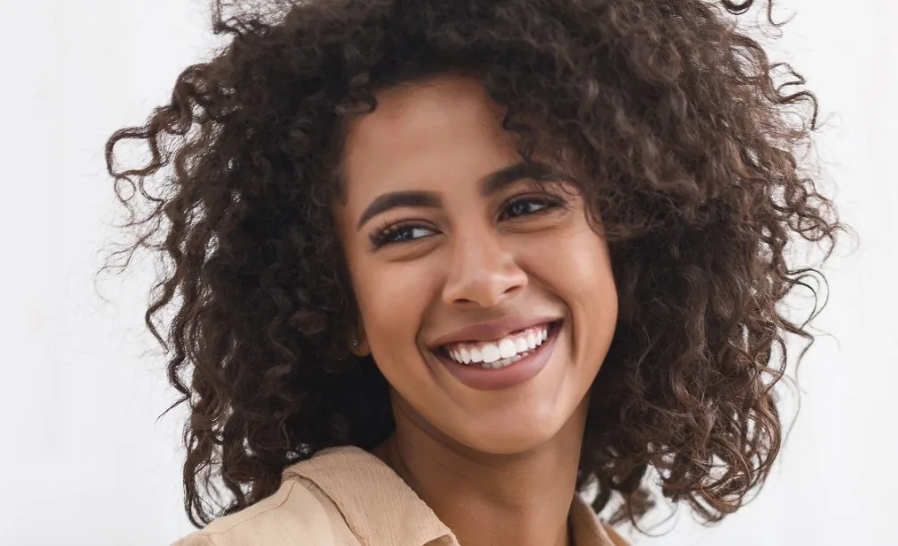 Woman grinning with a bright smile