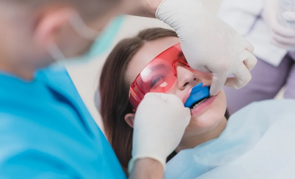 Woman receiving a fluoride treatment